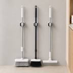 Drie compacte zelfklevende houders met normale mop, bezem en vloertrekker