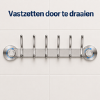 Twee draaivergrendelingen op dezelfde hoogte als de kapstokrail